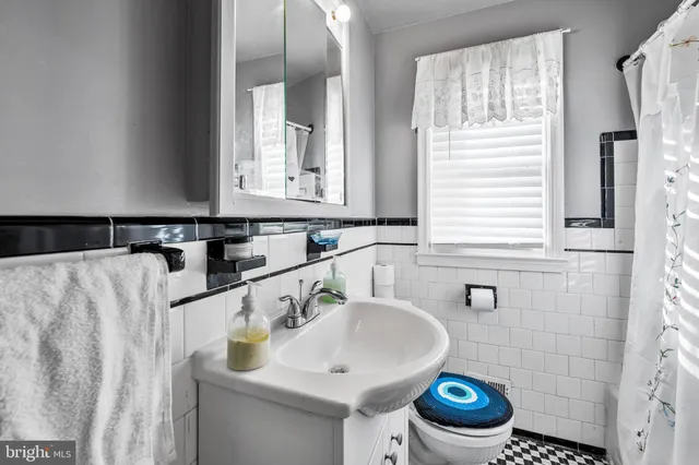 a bathroom with a sink and a toilet