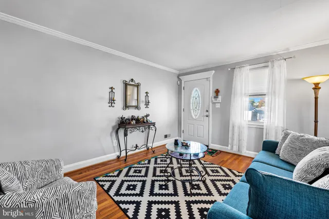 a living room with furniture and a couch