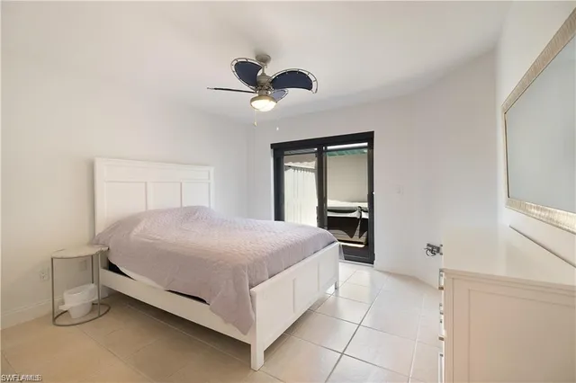 a bedroom with a bed and a walk in closet