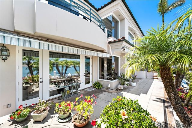 a view of a chairs and table in a patio