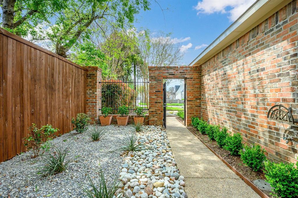 4209 Sexton Lane Dallas, TX 75229 - Photo 2 of 27 a view of a back yard from a balcony
