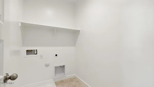 a view of white cabinet with a white cabinet