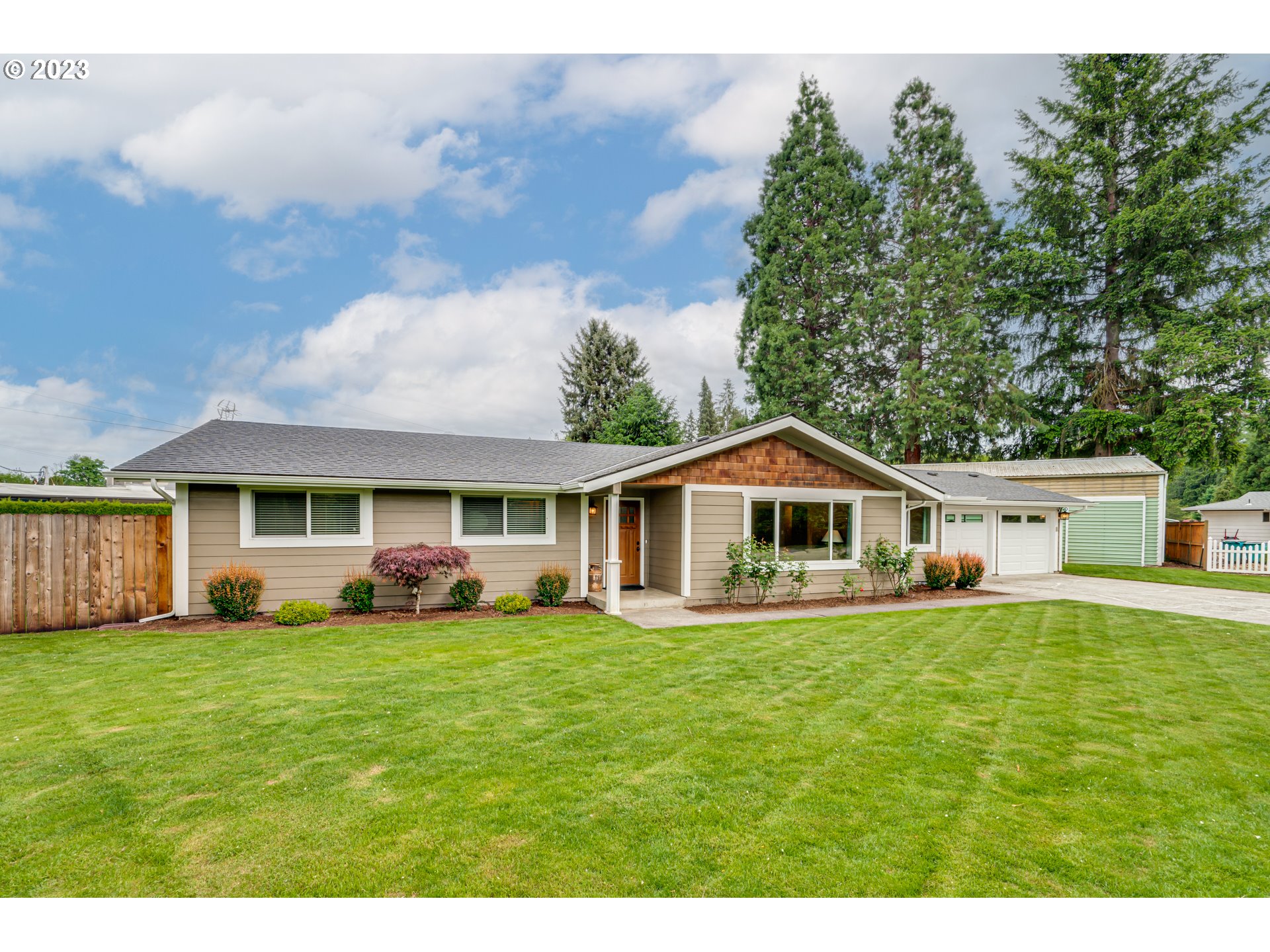 18721 Northeast Cramer Road Battle Ground, WA 98604 - Photo 1 of 32 a front view of a house with a yard