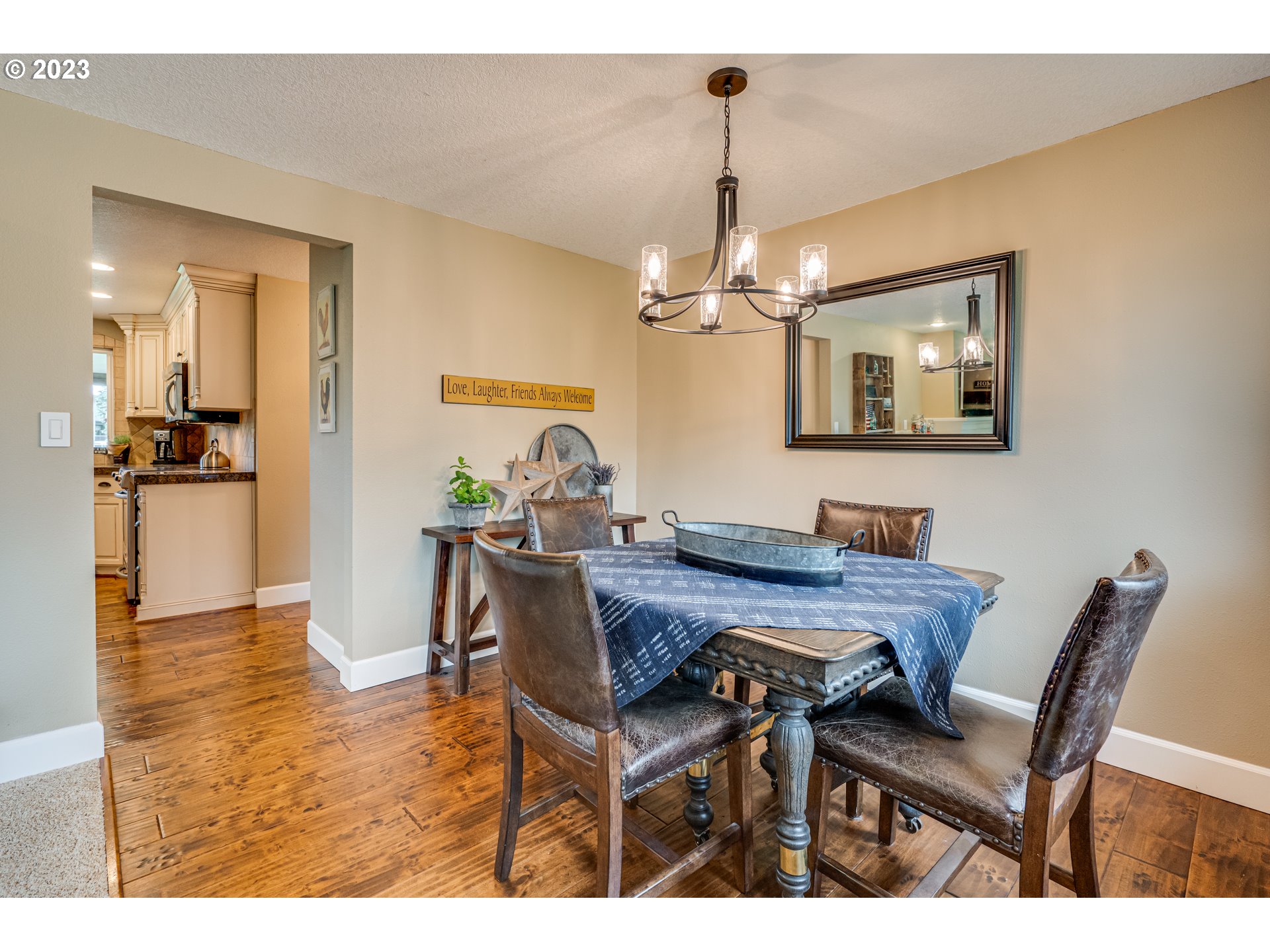 18721 Northeast Cramer Road Battle Ground, WA 98604 - Photo 11 of 32 a view of a dining room with furniture and wooden floor