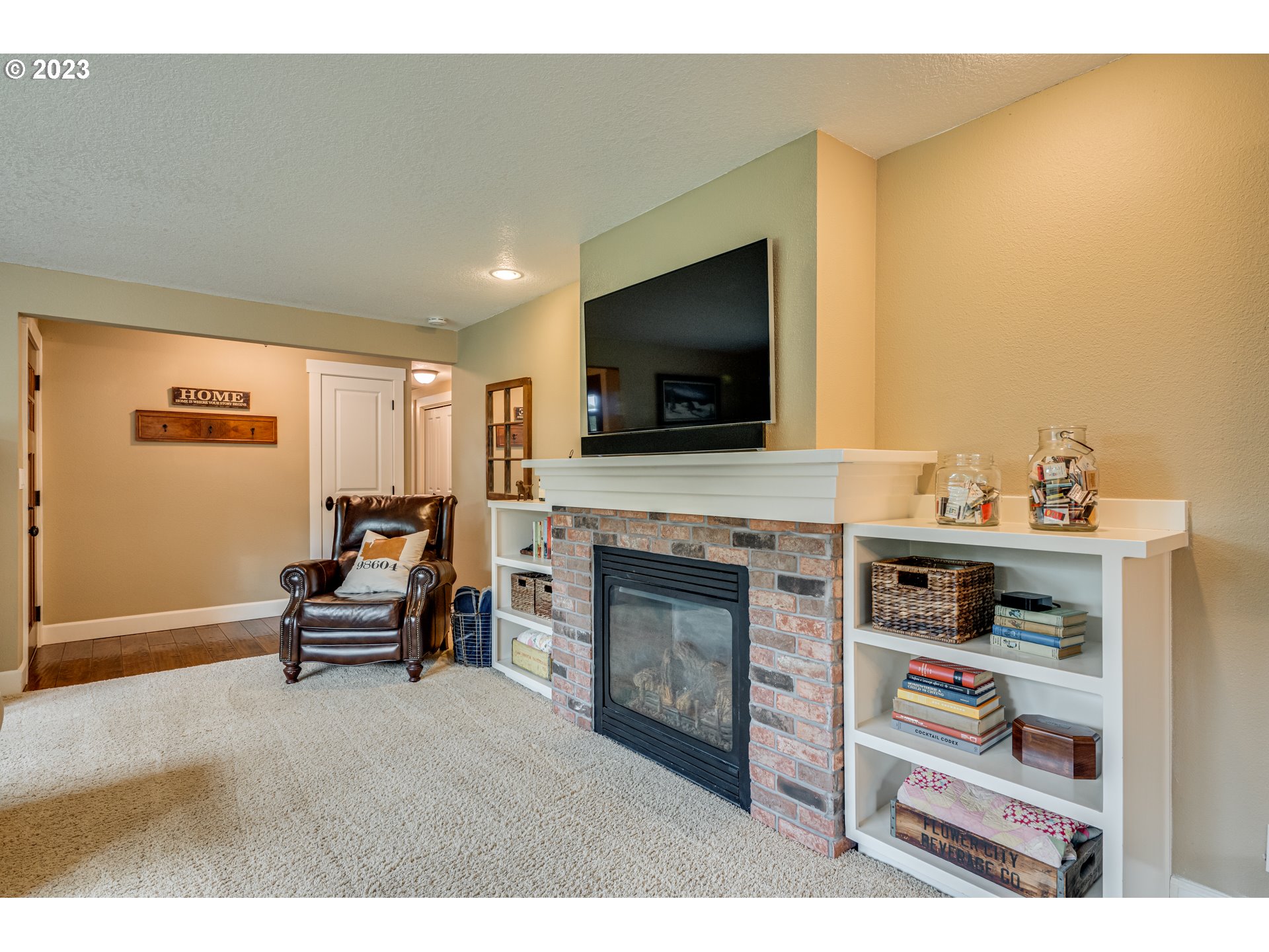 18721 Northeast Cramer Road Battle Ground, WA 98604 - Photo 13 of 32 a living room with furniture and a flat screen tv