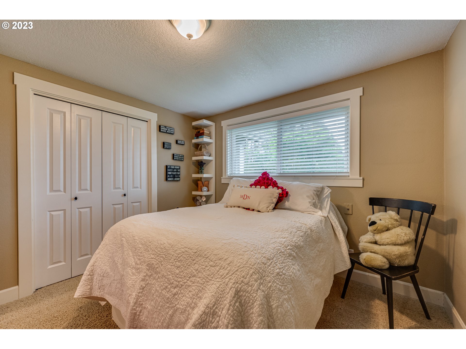 18721 Northeast Cramer Road Battle Ground, WA 98604 - Photo 18 of 32 a bedroom with a bed and a closet