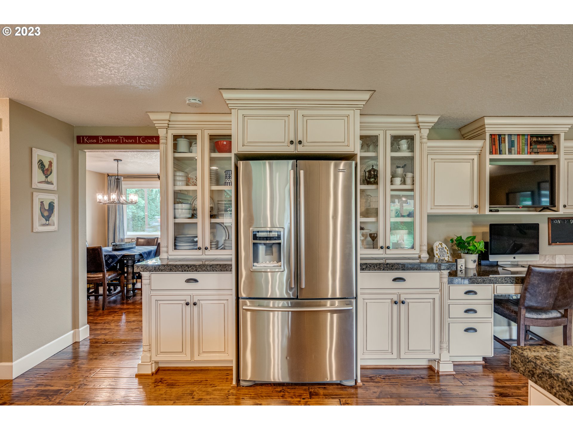 18721 Northeast Cramer Road Battle Ground, WA 98604 - Photo 7 of 32 a kitchen with stainless steel appliances a refrigerator and a cabinets