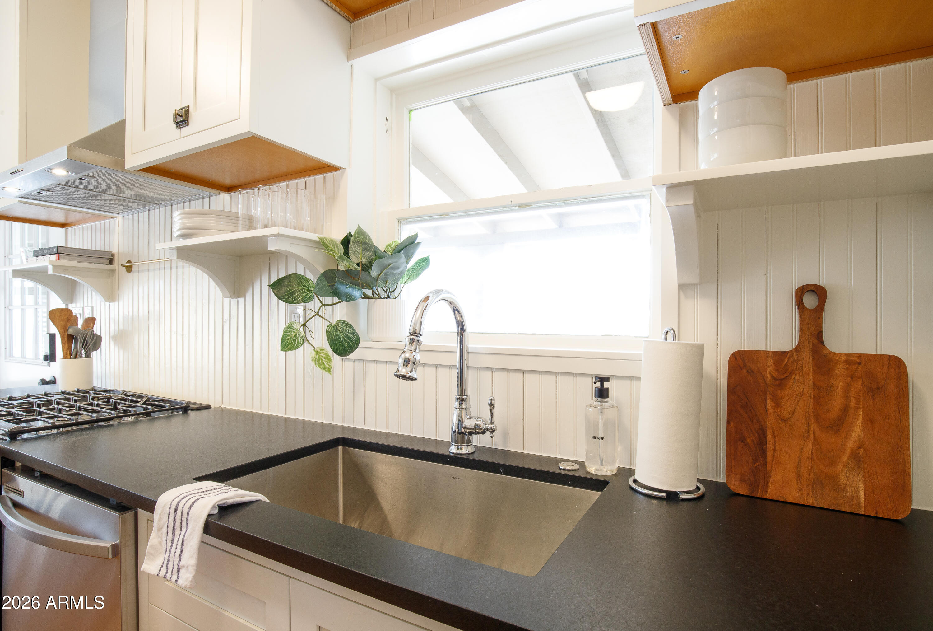 2549 North Mitchell Street Phoenix, AZ 85006 - Photo 13 of 41 a kitchen with a sink and a window
