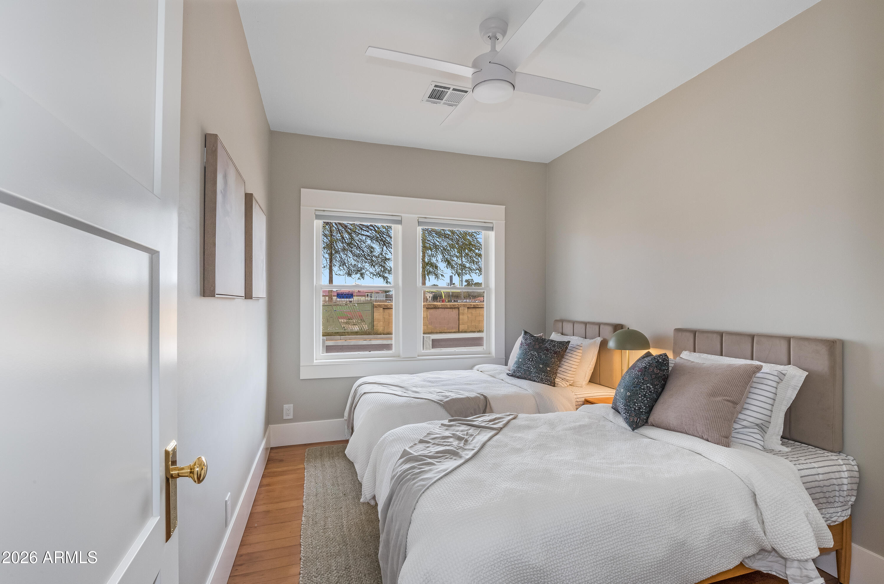 2549 North Mitchell Street Phoenix, AZ 85006 - Photo 19 of 41 a bedroom with a bed and a window