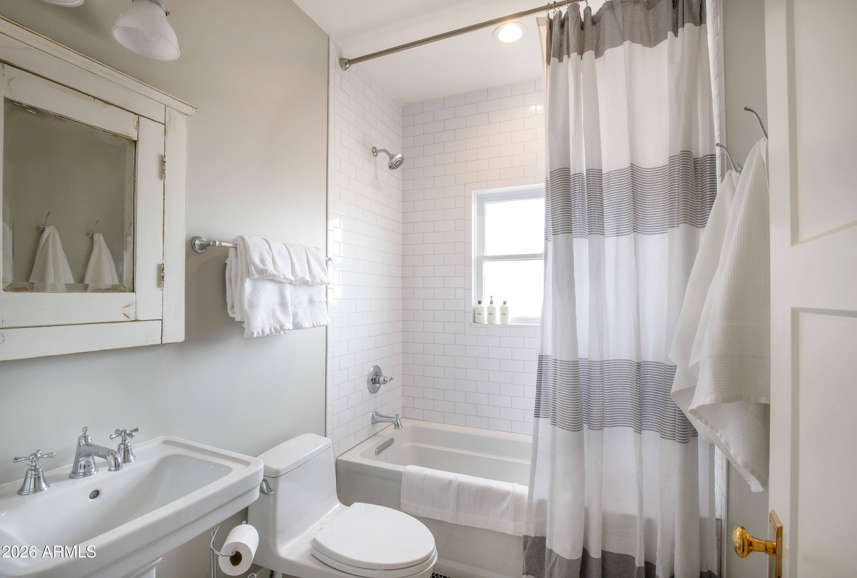 2549 North Mitchell Street Phoenix, AZ 85006 - Photo 20 of 41 a bathroom with a sink toilet and shower