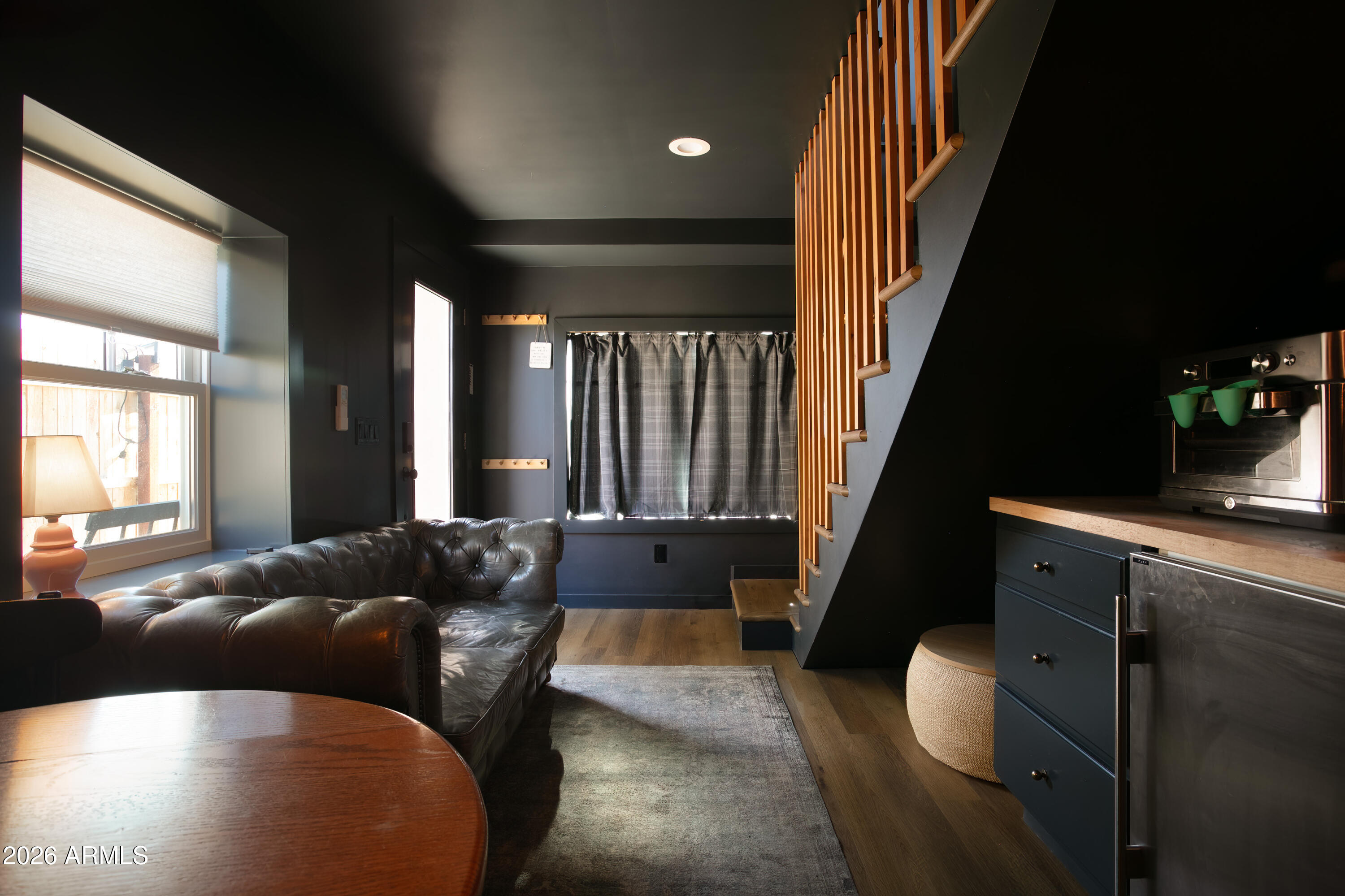 2549 North Mitchell Street Phoenix, AZ 85006 - Photo 27 of 41 a living room with furniture and a large window