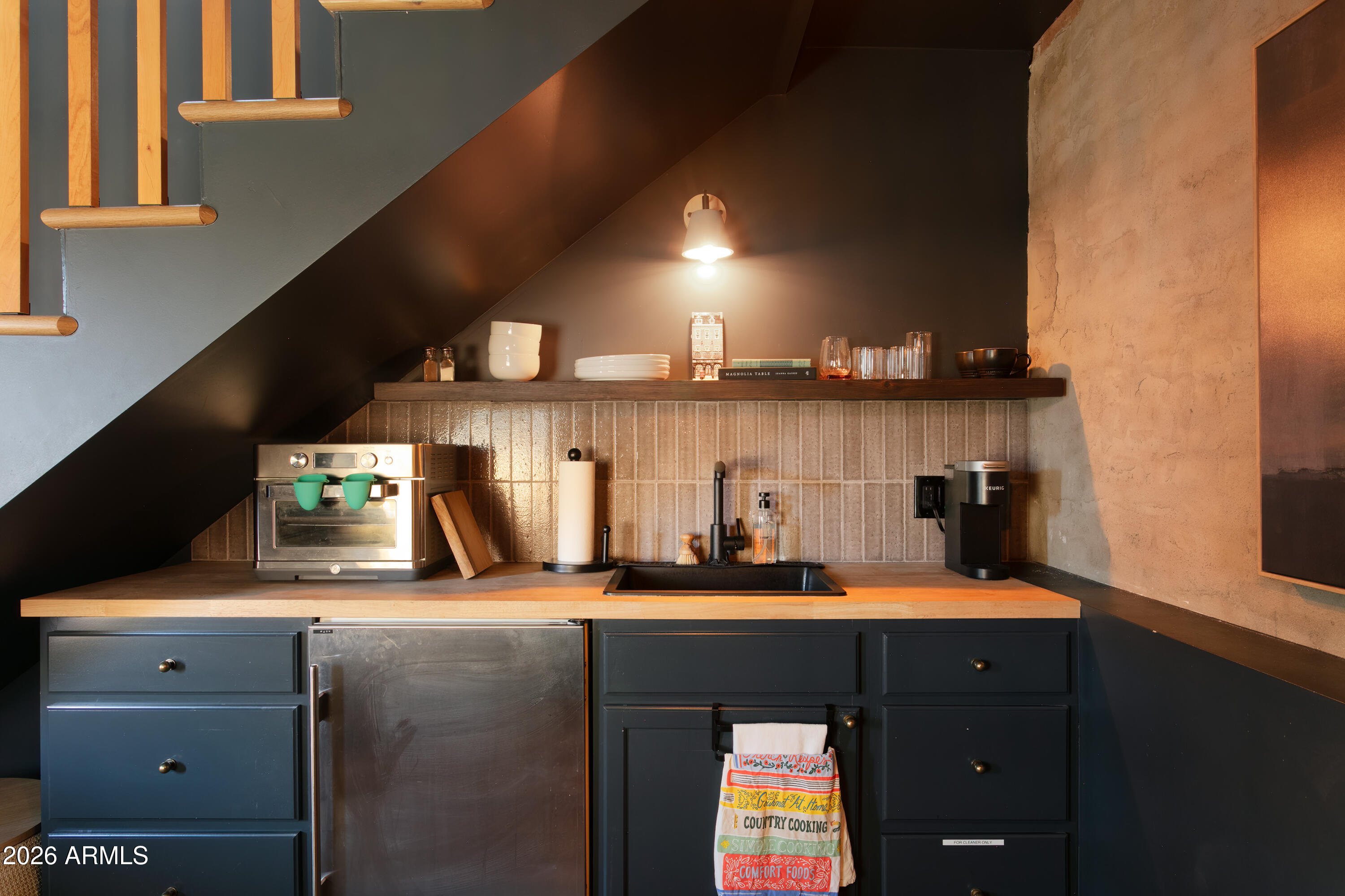 2549 North Mitchell Street Phoenix, AZ 85006 - Photo 31 of 41 a bathroom with a sink and a mirror