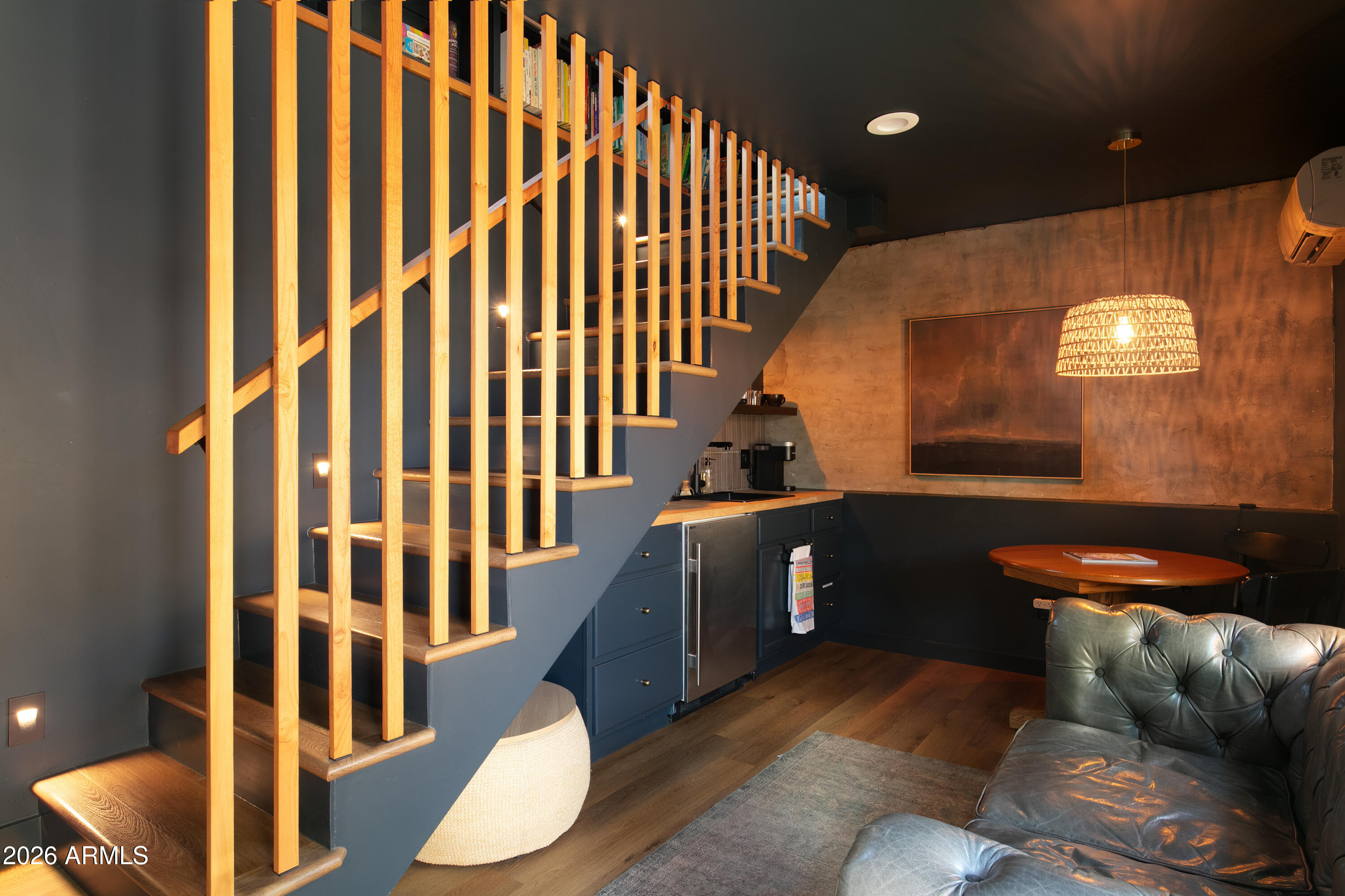 2549 North Mitchell Street Phoenix, AZ 85006 - Photo 32 of 41 a living room with furniture and a wooden floor