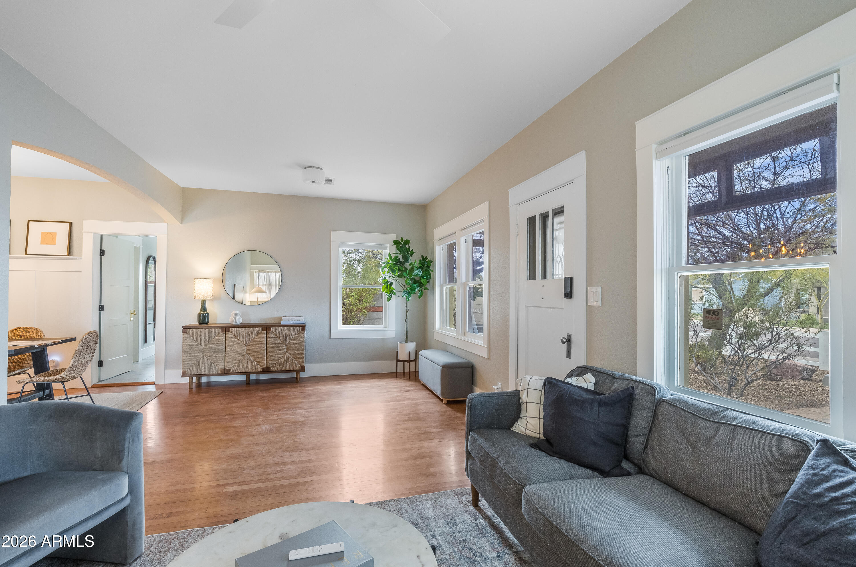 2549 North Mitchell Street Phoenix, AZ 85006 - Photo 6 of 41 a living room with furniture and a large window