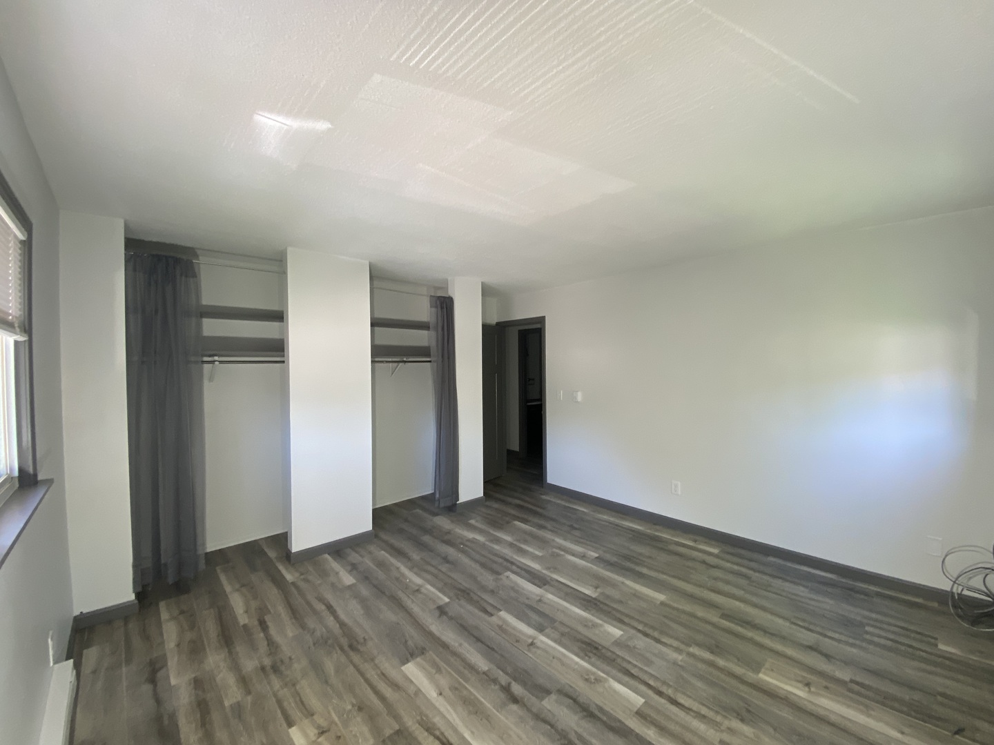 901 Walnut Avenue Dixon, IL 61021 - Photo 14 of 15 a view of an empty room with wooden floor and closet