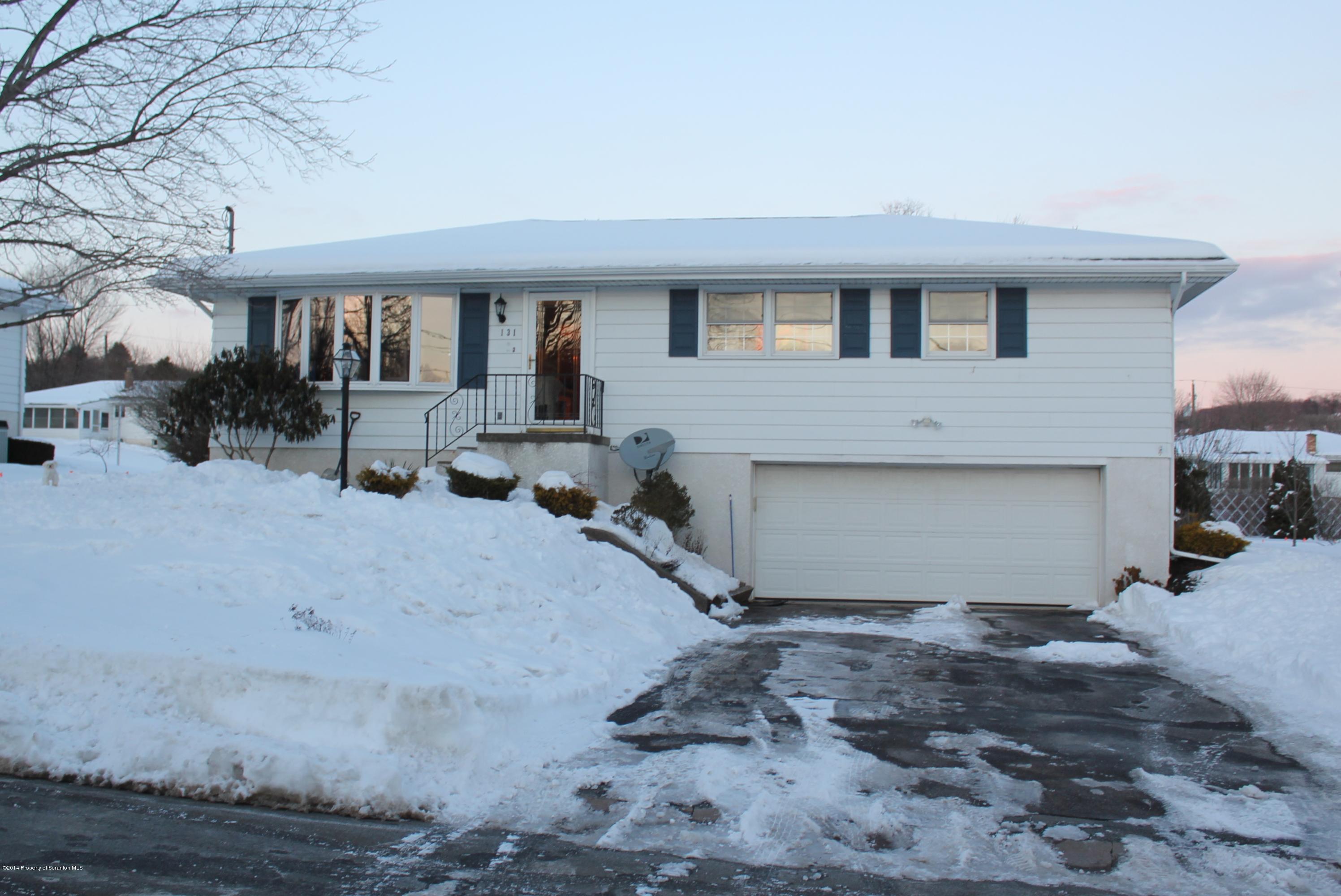 131 Shadetree Road Shavertown, PA 18708 - Photo 1 of 23 a front view of a house with a yard