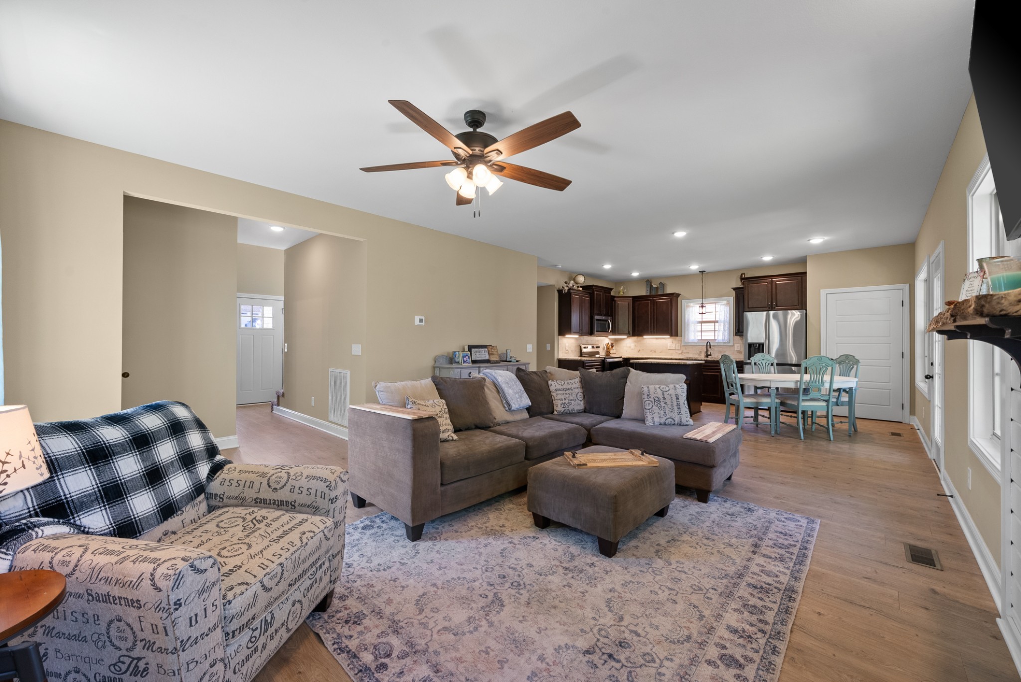 4406 Memory Lane Adams, TN 37010 - Photo 11 of 36 a living room with furniture a ceiling fan and a rug