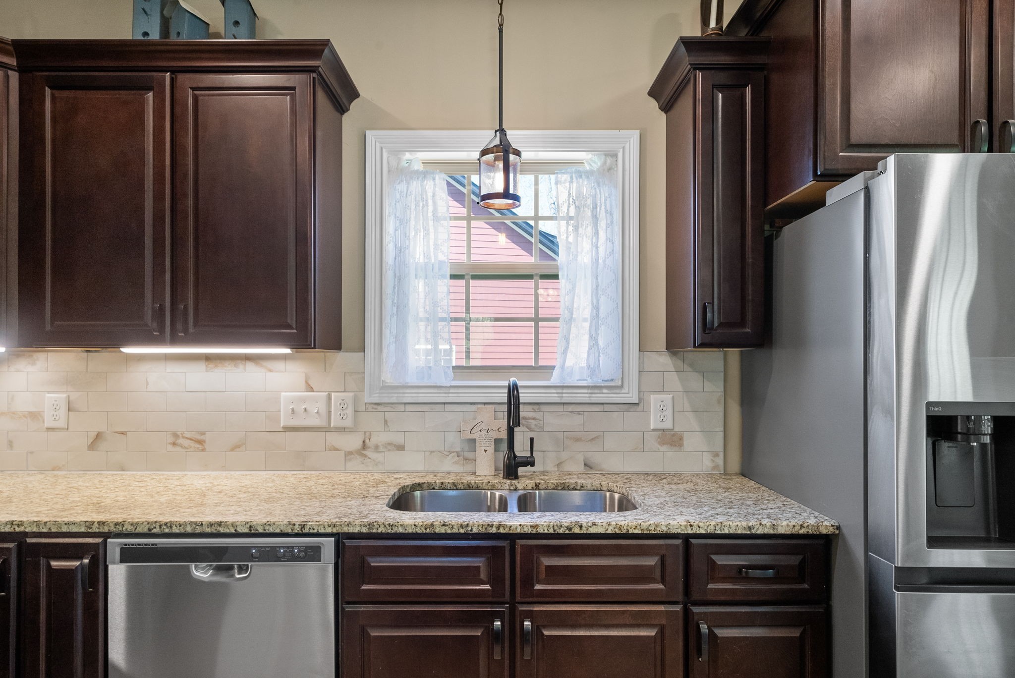 4406 Memory Lane Adams, TN 37010 - Photo 13 of 36 a kitchen with granite countertop a sink stainless steel appliances and cabinets