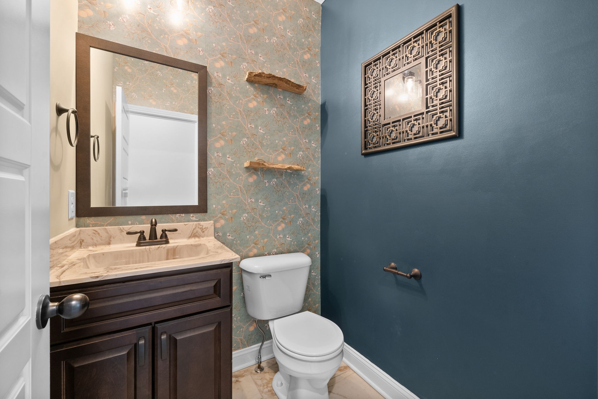 4406 Memory Lane Adams, TN 37010 - Photo 16 of 36 a bathroom with a toilet sink and mirror