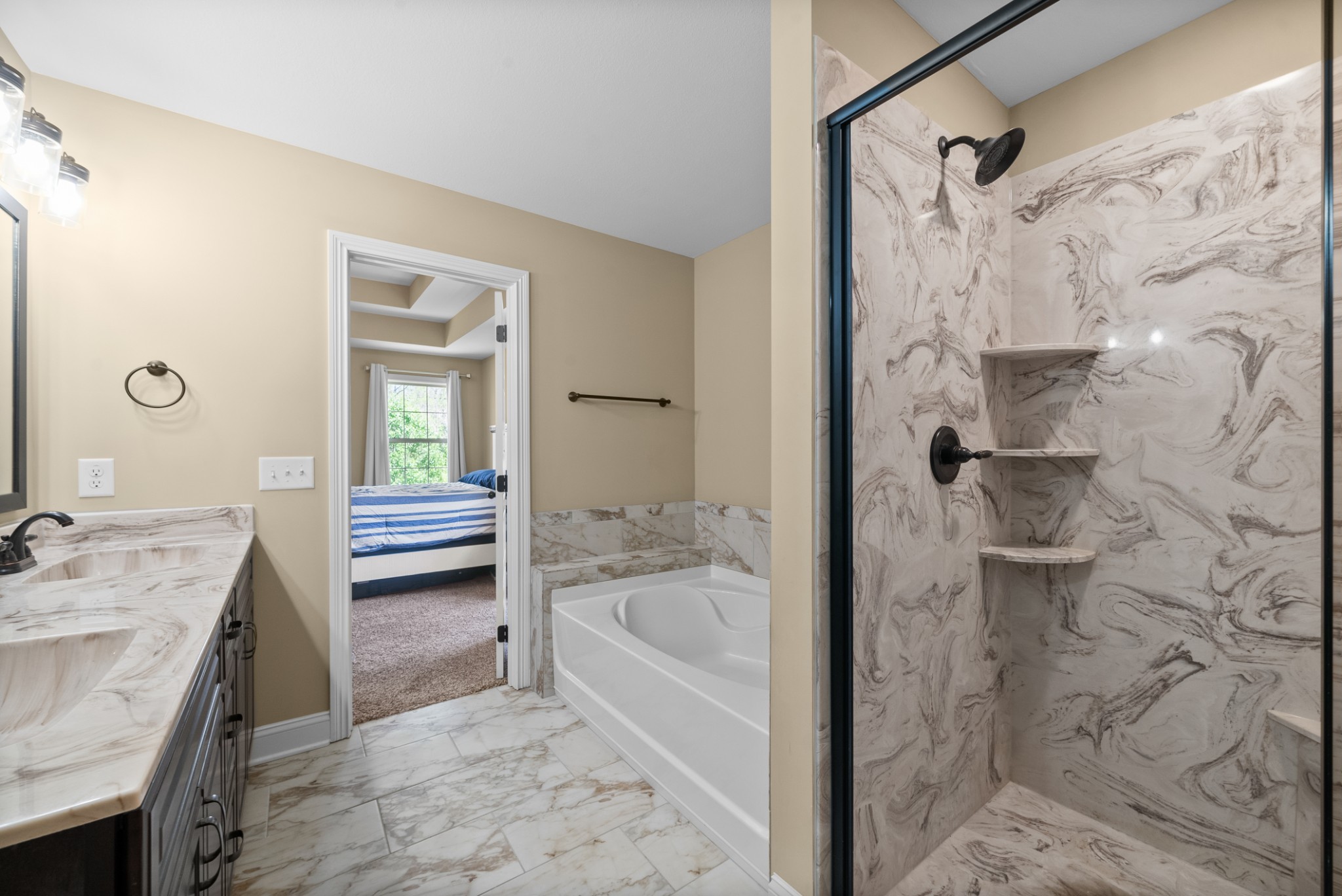 4406 Memory Lane Adams, TN 37010 - Photo 21 of 36 a spacious bathroom with a granite countertop sink a toilet and shower