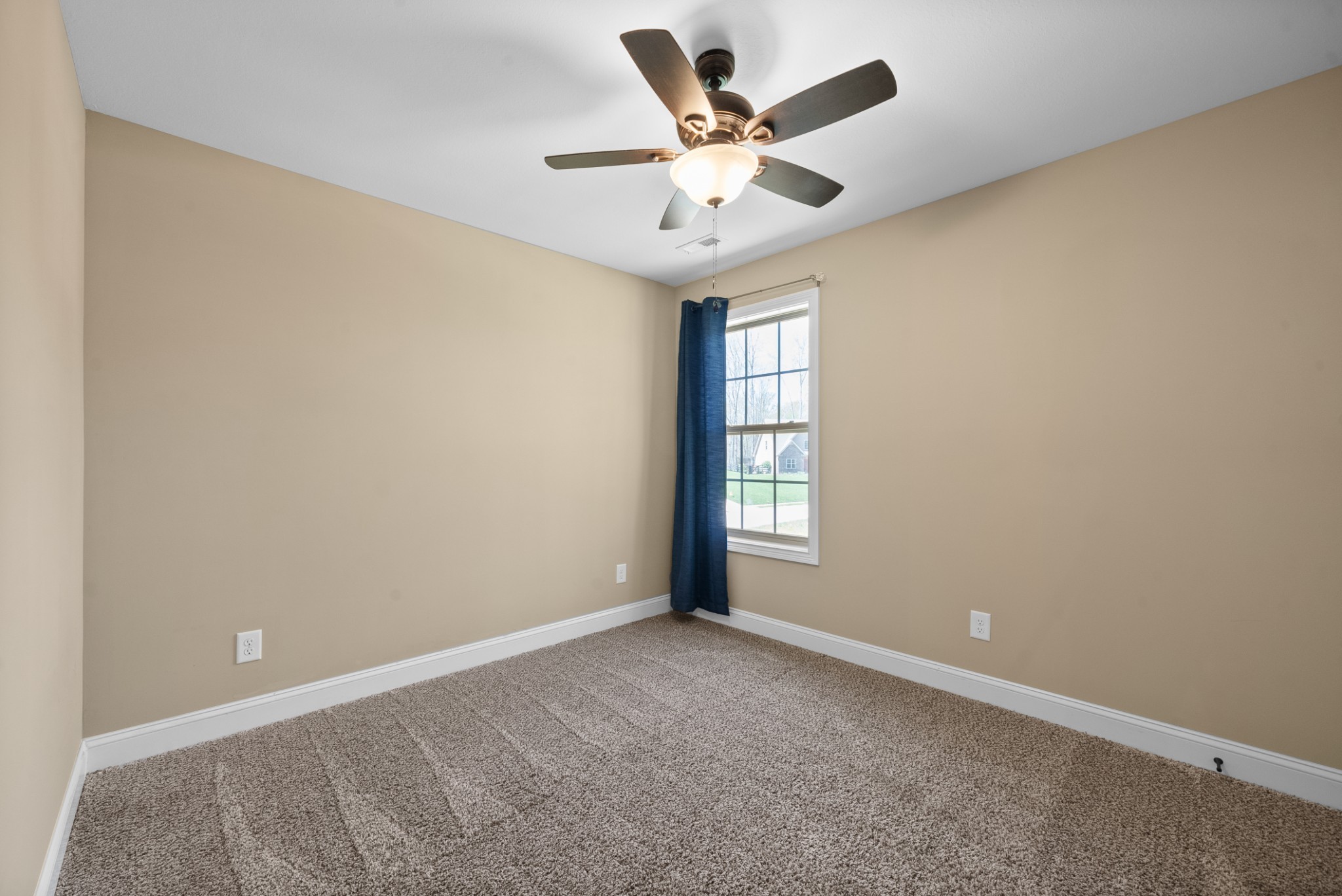 4406 Memory Lane Adams, TN 37010 - Photo 22 of 36 an empty room with windows and fan