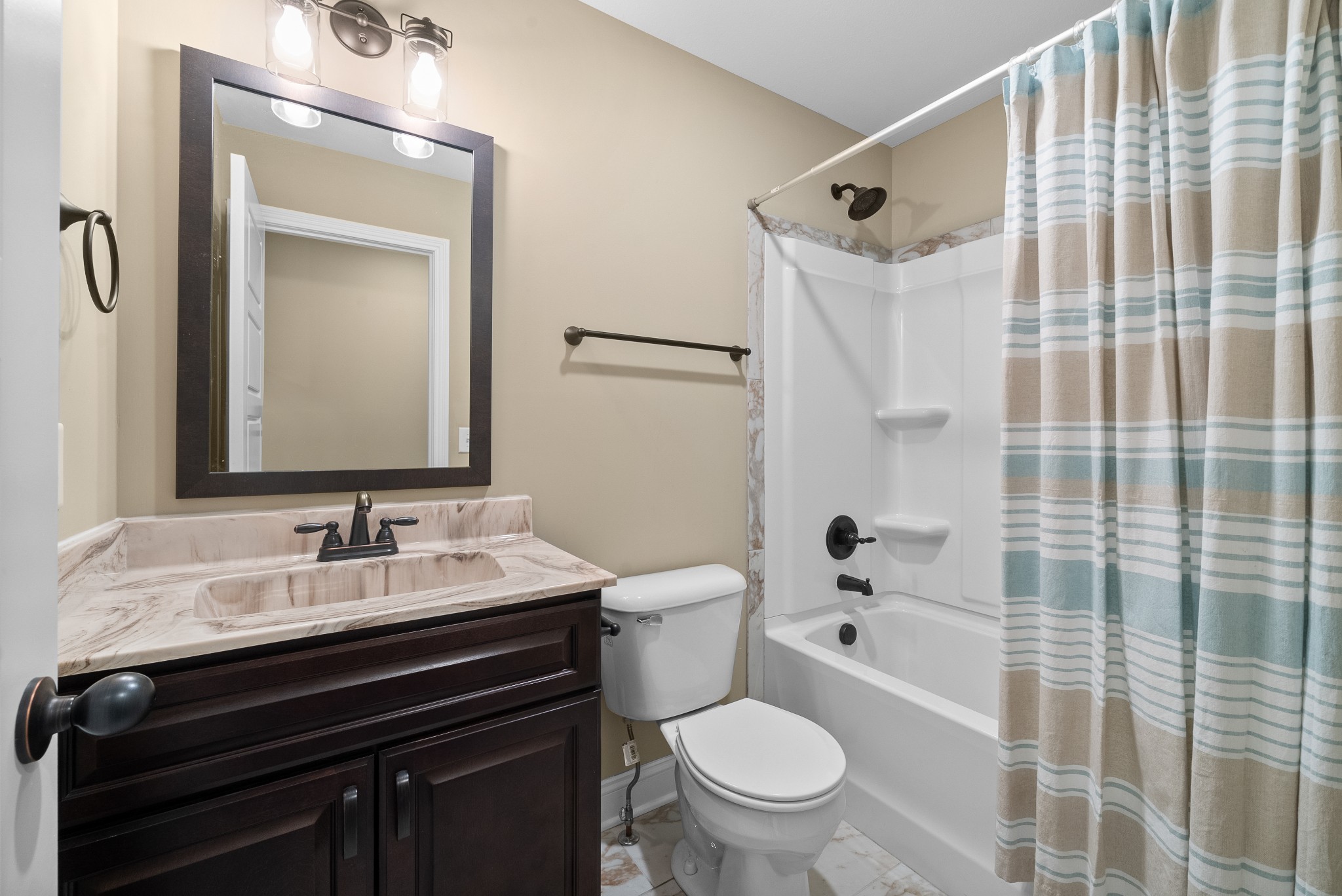 4406 Memory Lane Adams, TN 37010 - Photo 23 of 36 a bathroom with a sink a toilet and shower