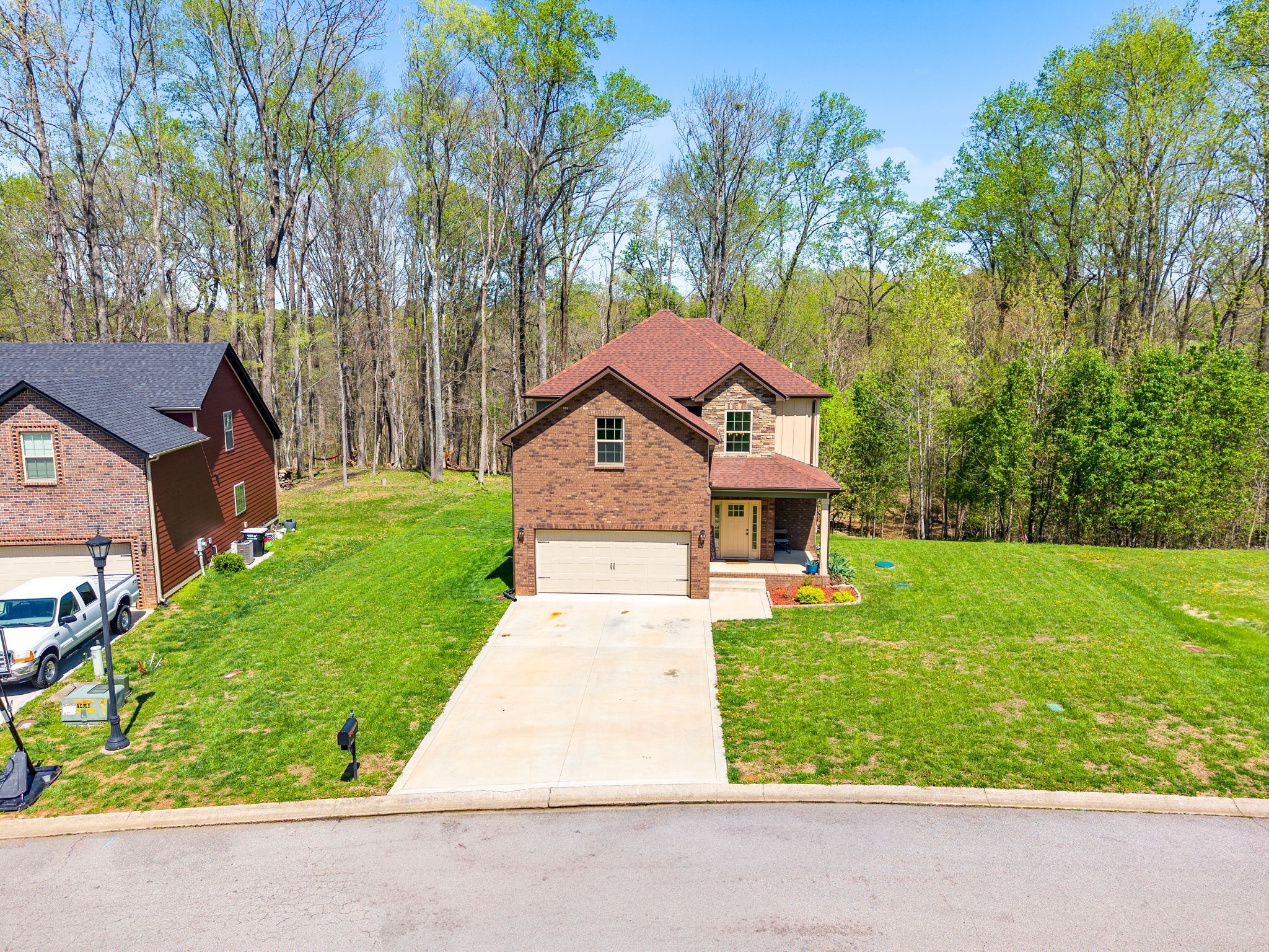 4406 Memory Lane Adams, TN 37010 - Photo 32 of 36 front view of a house with a yard