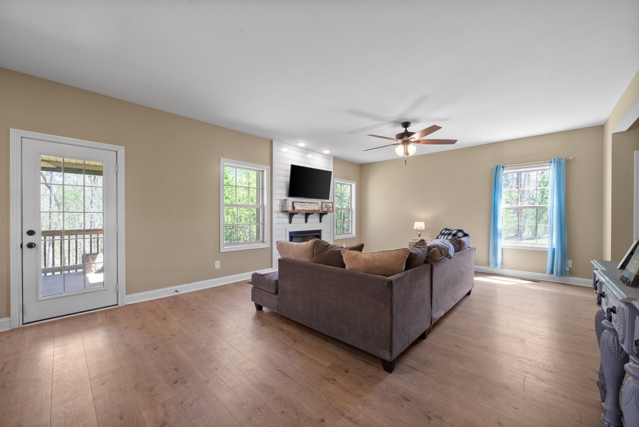 4406 Memory Lane Adams, TN 37010 - Photo 10 of 36 a living room with furniture and a flat screen tv