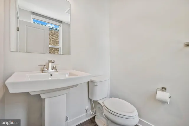 a spacious bedroom with a bed and a couch