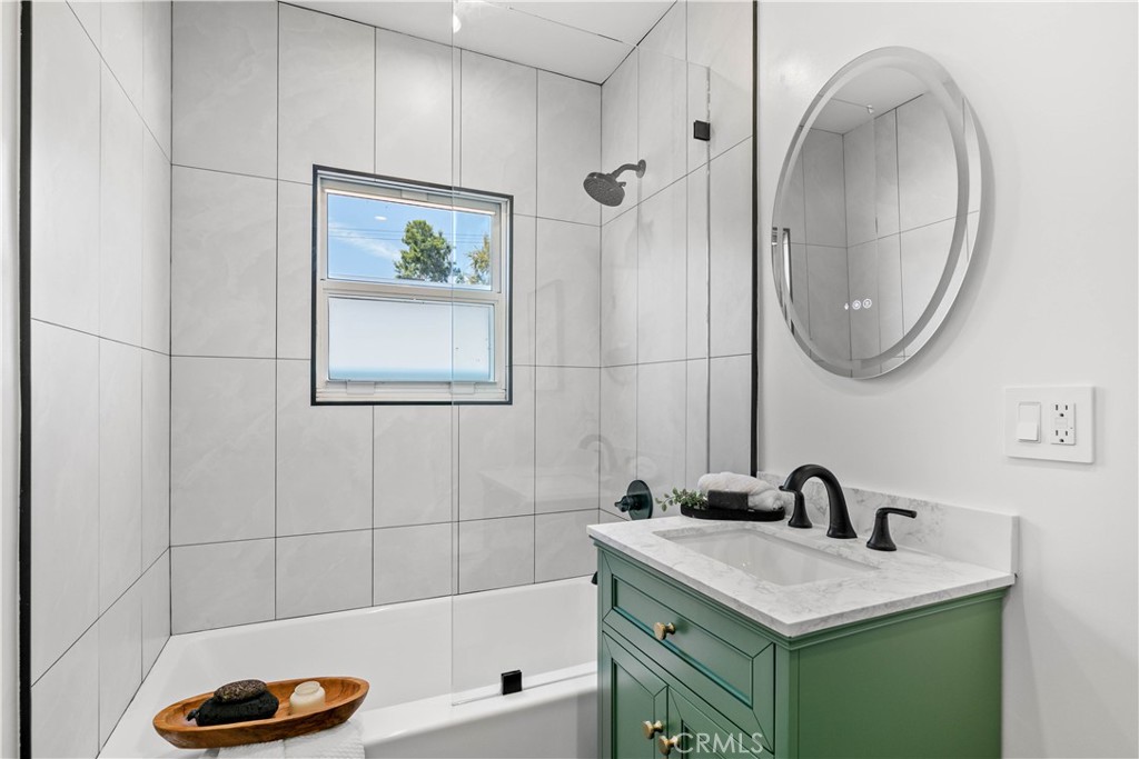 2105 N Pass Burbank, CA 91505 - Photo 25 of 31 a bathroom with a sink a toilet and a mirror