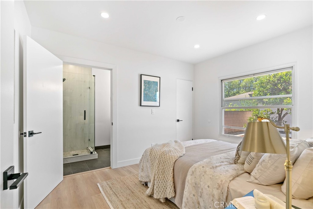 2105 N Pass Burbank, CA 91505 - Photo 27 of 31 a bedroom with a bed and a large window