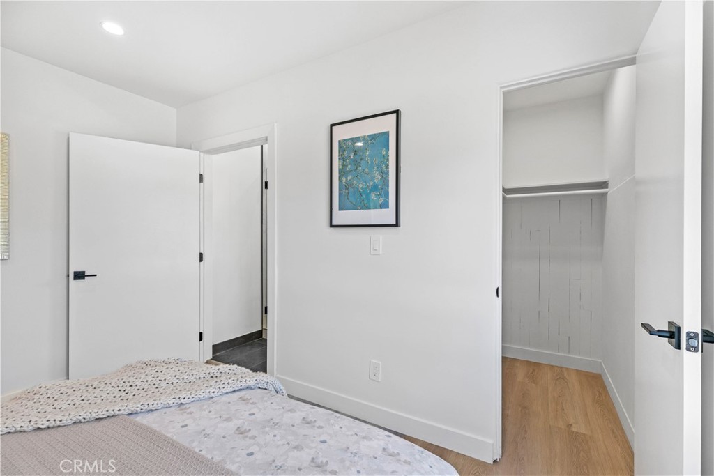 2105 N Pass Burbank, CA 91505 - Photo 30 of 31 a view of a hallway with wooden floor and closet
