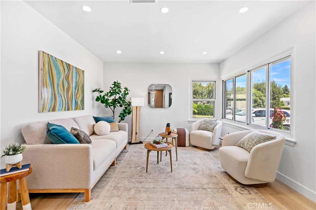 2105 N Pass Burbank, CA 91505 - Photo 7 of 31 a living room with furniture and a large window