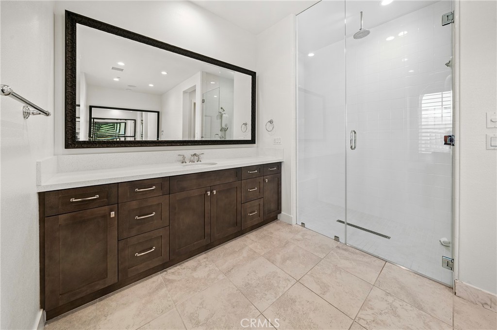 52 Eider Run Irvine, CA 92618 - Photo 43 of 46 a bathroom with a sink vanity and mirror