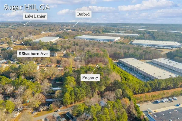 an aerial view of residential building and parking space