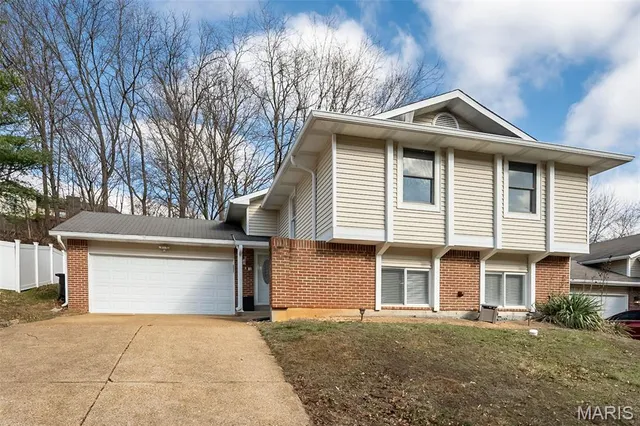 $365,000 | 537 Treetop Village Drive, Ballwin, MO 63021