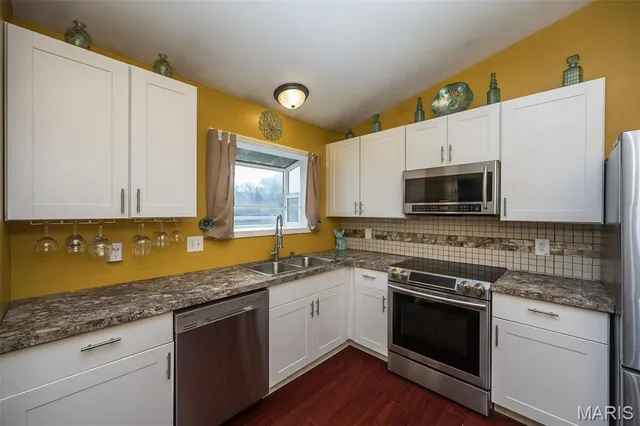 $365,000 | 537 Treetop Village Drive, Ballwin, MO 63021