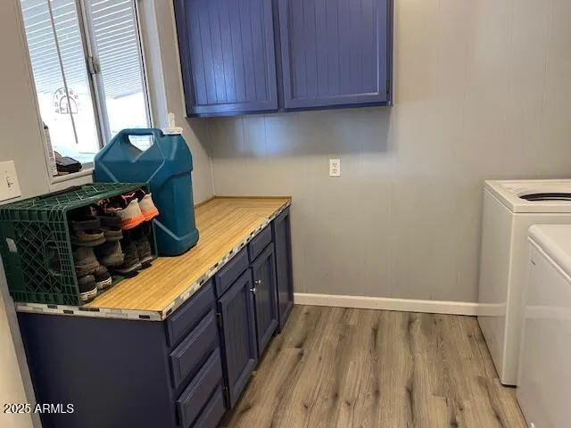 a kitchen with wooden cabinets and a sink