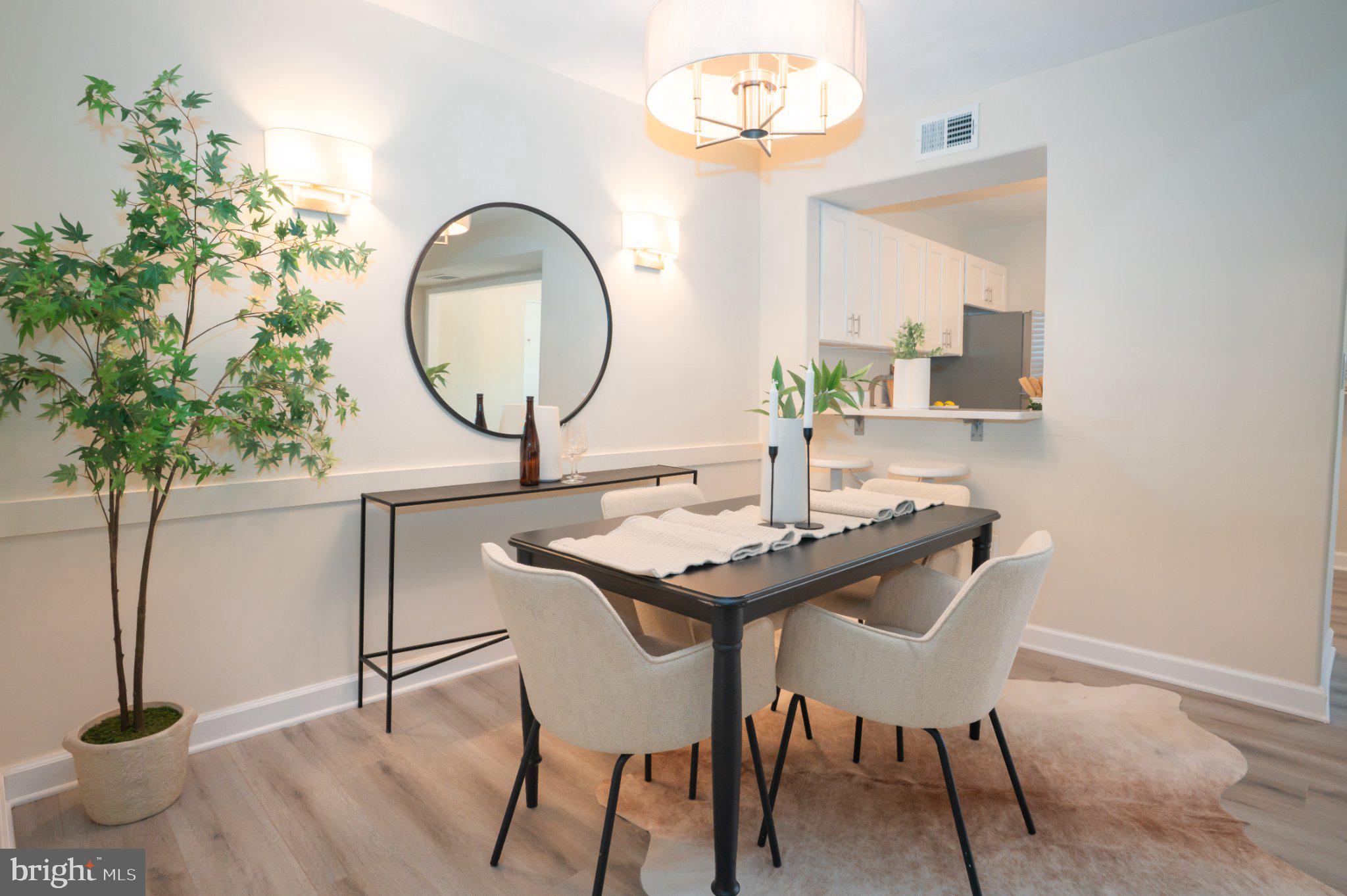 5860 Thunder Hill Road, Unit C1 Columbia, MD 21045 - Photo 13 of 22 Modern dining space with natural light.