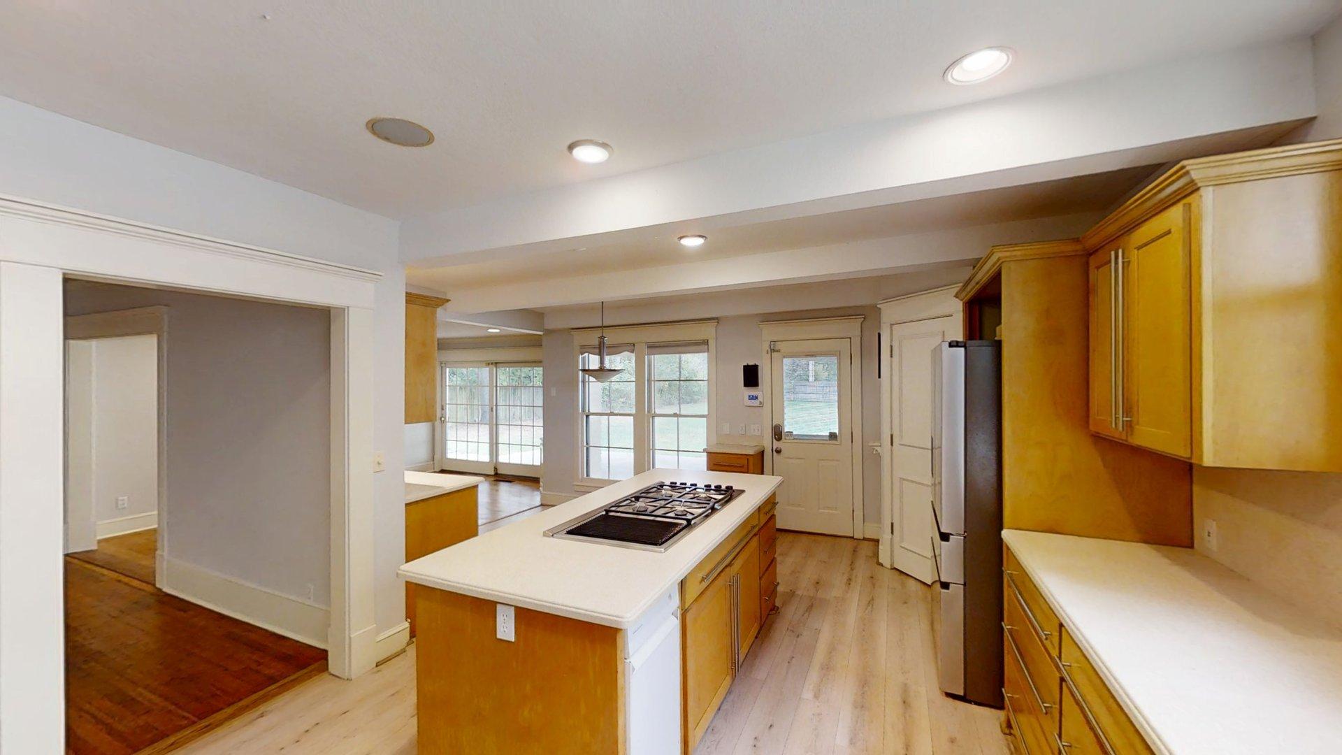 219 F Street Southwest Ardmore, OK 73401 - Photo 15 of 58 Light wood-finish flooring with recessed lighting