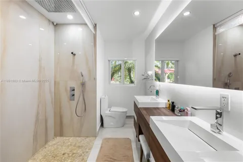 a bathroom with a sink and a toilet