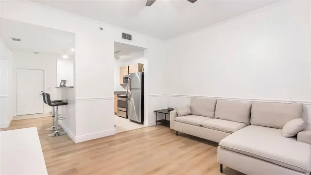 a living room with furniture and a couch