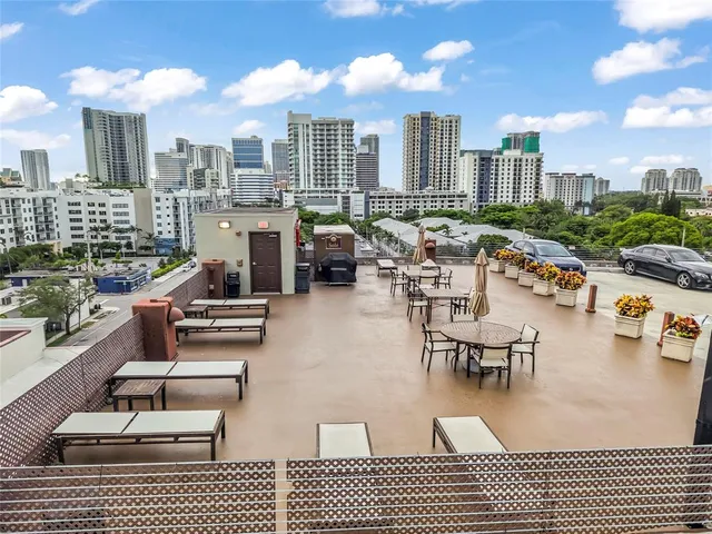 a view of a terrace with seating area