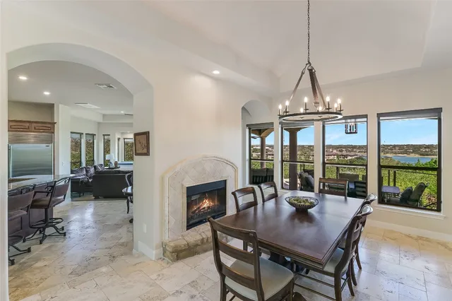 a view of a dining room with furniture window and outside view