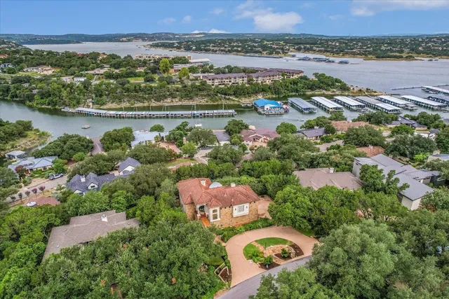 an aerial view of a city and lake view
