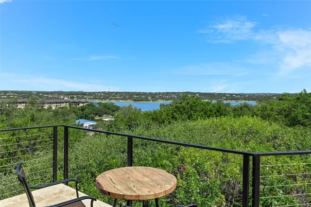 a view of a balcony with mountain view