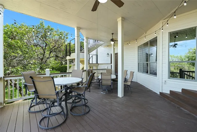 a view of an outside dining space with furniture window