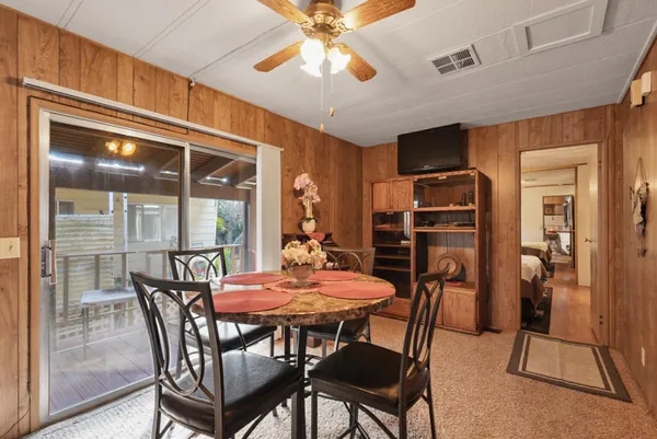 a bedroom with a bed and a lamp