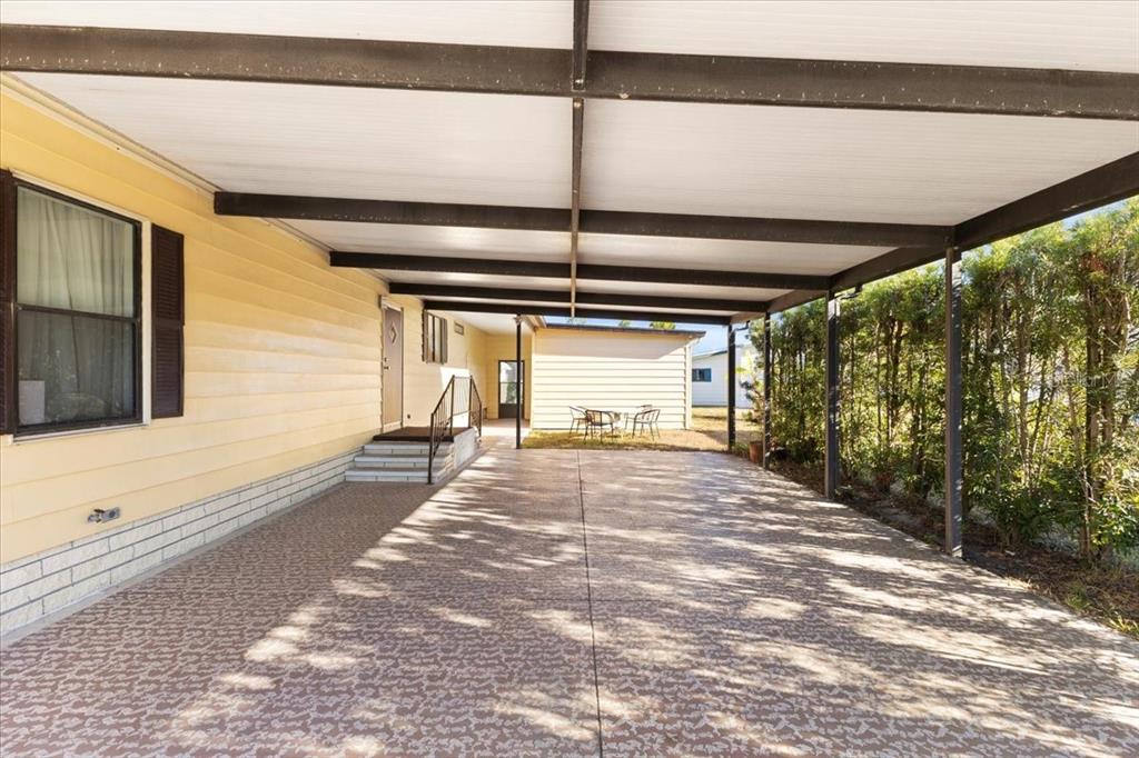 8308 Princess Court Palmetto, FL 34221 - Photo 19 of 23 a view of a backyard of a house