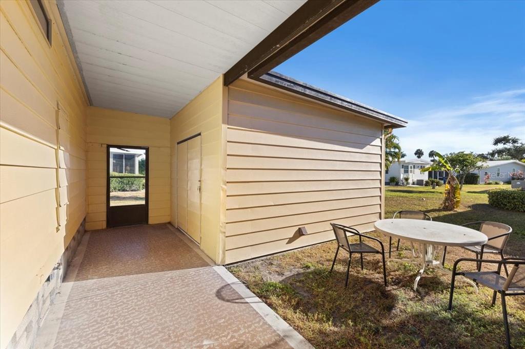 8308 Princess Court Palmetto, FL 34221 - Photo 20 of 23 a view of a outdoor space with seating area